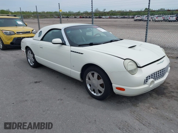 2003 Ford Thunderbird Deluxe z VIN 1FAHP60A03Y113355, wystawiony jako IAAI lot #41890414 z przebiegiem 147 620 mil mil oraz . Historia ofert i sprzedaży dostępna na DreamBid. Obrazek 1.