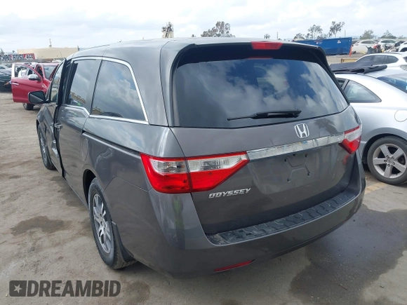 2011 Honda Odyssey EX-L with VIN 5FNRL5H61BB072124, listed as a IAAI auction lot 42115299 with 155,086 mi miles and . Bid and sale history available at DreamBid. Image 3.