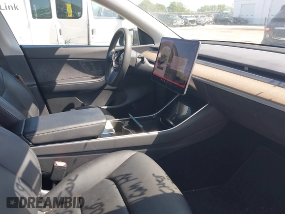 2021 Tesla Model Y Long Range with VIN 5YJYGDEE4MF076791, listed as a IAAI auction lot 41945750 with Not Provided miles and . Bid and sale history available at DreamBid. Image 5.