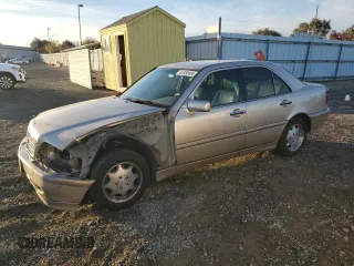 2000 Mercedes-Benz C 230/260/280/320 with VIN WDBHA29GXYA856258, listed as a Copart auction lot 80350404 with 245,687 mi miles and Salvage Title. Bid and sale history available at carsss.com. Image 1.