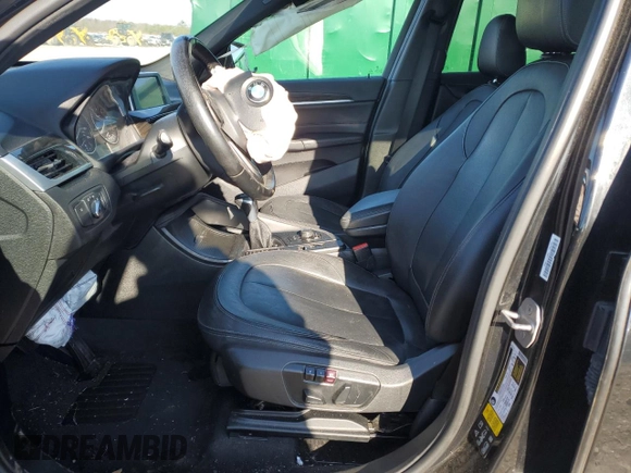 2017 BMW X1 xDrive28i with VIN WBXHT3C35H5F68640, listed as a Copart auction lot 85563114 with 103,480 mi miles and Salvage Title. Bid and sale history available at carsss.com. Image 7.