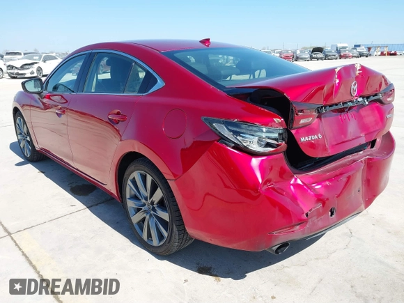 2020 Mazda 6 Grand Touring with VIN JM1GL1TY7L1511054, listed as a IAAI auction lot 41734848 with 70,573 mi miles and . Bid and sale history available at carsss.com. Image 3.