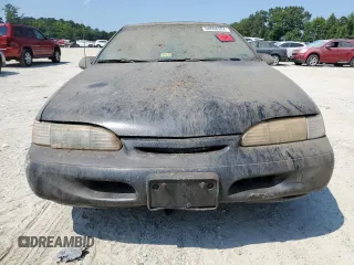 1995 Ford Thunderbird LX z VIN 1FALP62W2SH151865, wystawiony jako Copart lot #68608984 z przebiegiem 75 272 mil mil oraz Czysty tytuł • Clean title. Historia ofert i sprzedaży dostępna na DreamBid. Obrazek 5.