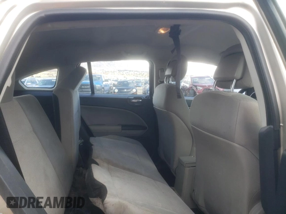 2010 Dodge Caliber SXT with VIN 1B3CB4HA2AD586417, listed as a Copart auction lot 47697675 with 150,021 mi miles and Salvage Title. Bid and sale history available at DreamBid. Image 12.