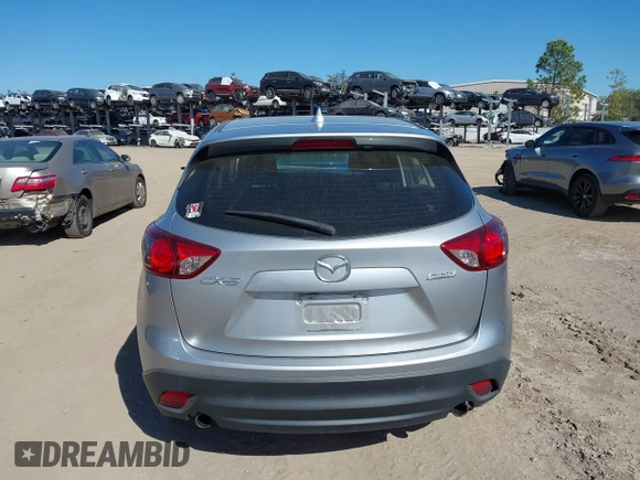 2016 Mazda CX-5 Sport with VIN JM3KE2BE9G0915168, listed as a IAAI auction lot 41482749 with 86,802 mi miles and . Bid and sale history available at carsss.com. Image 16.