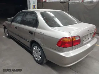 2000 Honda Civic LX with VIN 2HGEJ6674YH532404, listed as a IAAI auction lot 41998834 with 94,504 mi miles. Bid and sale history available at carsss.com. Image 3.
