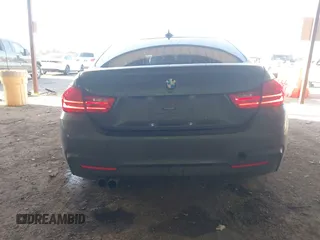 2015 BMW 4 Series 428i with VIN WBA4A5C54FG051307, listed as a IAAI auction lot 41774596 with 126,852 mi miles and . Bid and sale history available at carsss.com. Image 16.