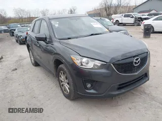 2015 Mazda CX-5 Touring with VIN JM3KE4CY1F0439016, listed as a IAAI auction lot 42039259 with 201,325 mi miles and . Bid and sale history available at carsss.com. Image 1.