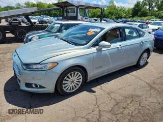2013 Ford Fusion SE Hybrid z VIN 3FA6P0LU3DR240594, wystawiony jako Copart lot #64823175 z przebiegiem 102 275 mil mil oraz Czysty tytuł • Clean title. Historia ofert i sprzedaży dostępna na DreamBid. Obrazek 1.