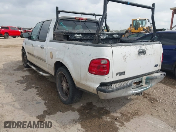 2002 Ford F-150 XLT with VIN 1FTRW07602KB74836, listed as a IAAI auction lot 42069307 with 295,692 mi miles. Bid and sale history available at carsss.com. Image 3.