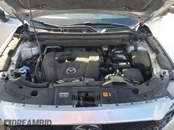 2019 Mazda CX-5 Touring with VIN JM3KFACMXK1556090, listed as a Copart auction lot 47541005 with 82,030 mi miles and Salvage Title. Bid and sale history available at carsss.com. Image 14.