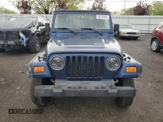 2002 Jeep Wrangler X z VIN 1J4FA39S32P767598, wystawiony jako Copart lot #55974555 z przebiegiem 177 793 mil mil oraz Czysty tytuł • Clean title. Historia ofert i sprzedaży dostępna na DreamBid. Obrazek 5.