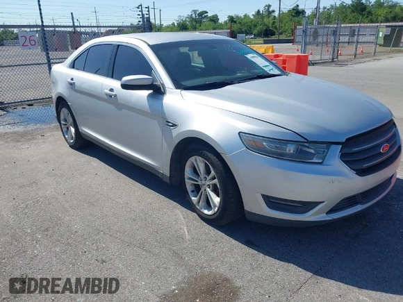 2013 Ford Taurus SEL with VIN 1FAHP2E81DG129229, listed as a IAAI auction lot 41999326 with 205,856 mi miles. Bid and sale history available at carsss.com. Image 1.