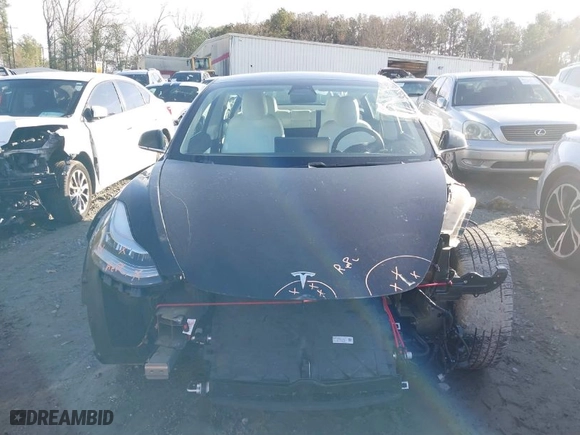 2019 Tesla Model 3 Mid Range with VIN 5YJ3E1EA4KF317872, listed as a IAAI auction lot 41491269 with 90,772 mi miles. Bid and sale history available at carsss.com. Image 11.