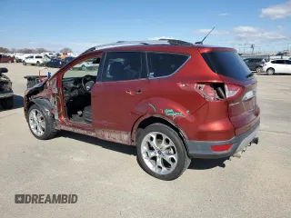 2014 Ford Escape Titanium with VIN 1FMCU9J94EUA22162, listed as a Copart auction lot 47311545 with 132,201 mi miles and Salvage Title. Bid and sale history available at DreamBid. Image 2.