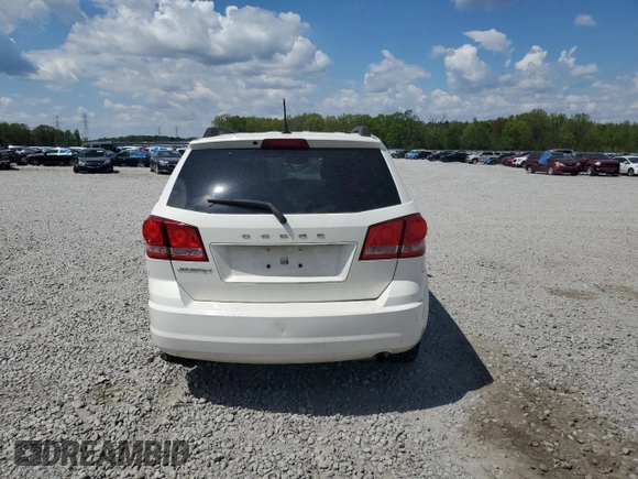 2013 Dodge Journey SE with VIN 3C4PDCAB3DT699816, listed as a Copart auction lot 52856455 with 67,688 mi miles and Salvage Title. Bid and sale history available at carsss.com. Image 6.