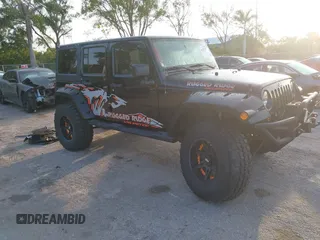 2013 Jeep Wrangler Unlimited Sport z VIN 1C4BJWDG2DL590755, wystawiony jako IAAI lot #42302347 z przebiegiem 109 846 mil mil oraz . Historia ofert i sprzedaży dostępna na DreamBid. Obrazek 1.