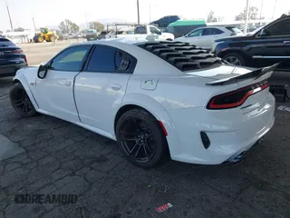 2023 Dodge Charger Scat Pack Widebody with VIN 2C3CDXGJ6PH635498, listed as a IAAI auction lot 41448100 with 13,678 mi miles and . Bid and sale history available at DreamBid. Image 3.