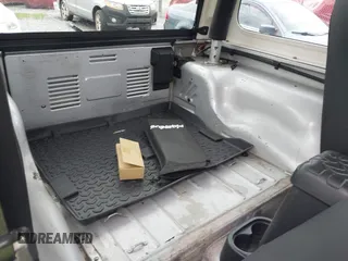 2006 Jeep Wrangler Rubicon с VIN 1J4FA69S16P723008, выставлен на аукционе IAAI как лот 42632982 с пробегом 128 512 миль миль и . История ставок и продаж доступна на DreamBid. Изображение 8.