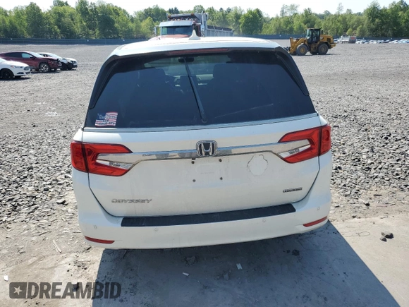 2019 Honda Odyssey Touring with VIN 5FNRL6H81KB051846, listed as a Copart auction lot 58723015 with 68,142 mi miles and Salvage title. Bid and sale history available at DreamBid. Image 6.