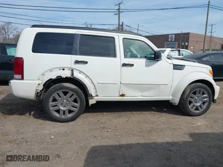 2007 Dodge Nitro R/T with VIN 1D8GU58687W720700, listed as a IAAI auction lot 41802485 with 203,575 mi miles. Bid and sale history available at carsss.com. Image 13.