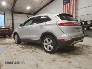 2018 Lincoln MKC Premiere with VIN 5LMCJ1C90JUL07472, listed as a Copart auction lot 50595015 with 74,989 mi miles and Salvage Title. Bid and sale history available at DreamBid. Image 2.