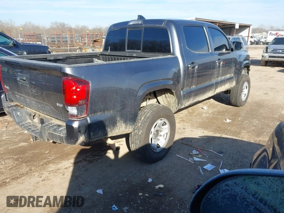 2023 Toyota Tacoma 4WD SR with VIN 3TMCZ5AN4PM582962, listed as a IAAI auction lot 41373504 with 34,138 mi miles. Bid and sale history available at carsss.com. Image 4.