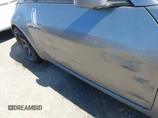 2003 Nissan 350Z Touring z VIN JN1AZ34E03T004458, wystawiony jako IAAI lot #42361684 z przebiegiem 147 847 mil mil oraz . Historia ofert i sprzedaży dostępna na DreamBid. Obrazek 12.