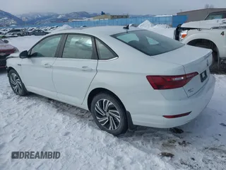 2021 Volkswagen Jetta SEL с VIN 3VWE57BU2MM051239, выставлен на аукционе IAAI как лот 41539604 с пробегом 63 017 миль миль и . История ставок и продаж доступна на DreamBid. Изображение 3.