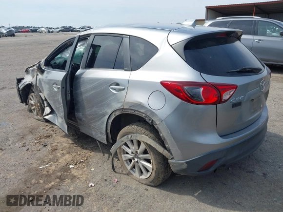 2015 Mazda CX-5 Touring with VIN JM3KE2CY6F0432910, listed as a IAAI auction lot 41784545 with 210,787 mi miles. Bid and sale history available at carsss.com. Image 3.