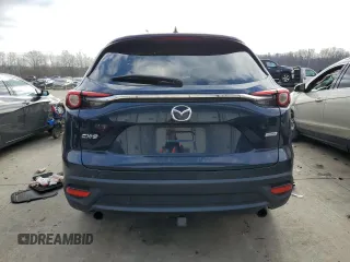 2019 Mazda CX-9 Sport с VIN JM3TCABY2K0321285, выставлен на аукционе Copart как лот 85372004 с пробегом 57 423 миль миль и Списание • Salvage title. История ставок и продаж доступна на DreamBid. Изображение 6.