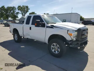 2014 Ford F-250 XL with VIN 1FT7X2B64EEB66846, listed as a Copart auction lot 57212565 with 261,721 mi miles and Salvage title. Bid and sale history available at DreamBid. Image 4.