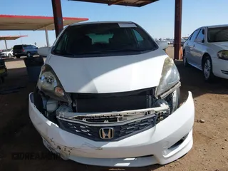 2012 Honda Fit Sport with VIN JHMGE8H55CC000608, listed as a IAAI auction lot 42025275 with 111,621 mi miles. Bid and sale history available at carsss.com. Image 12.