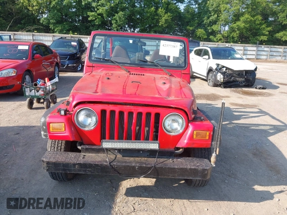 2000 Jeep Wrangler SE with VIN 1J4FA29P6YP775127, listed as a IAAI auction lot 42377387 with Not provided miles and . Bid and sale history available at DreamBid. Image 6.