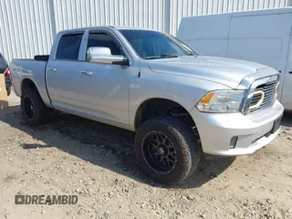 2014 Ram 1500 Express z VIN 1C6RR6KTXES435490, wystawiony jako IAAI lot #42038713 z przebiegiem 128 707 mil mil oraz . Historia ofert i sprzedaży dostępna na DreamBid. Obrazek 1.
