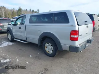 2007 Ford F-150 XL with VIN 1FTRF12W67NA40142, listed as a IAAI auction lot 41617797 with 216,585 mi miles. Bid and sale history available at carsss.com. Image 3.