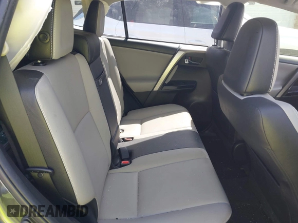 2016 Toyota RAV4 Hybrid Limited with VIN JTMDJREV7GD047729, listed as a IAAI auction lot 41833765 with 114,830 mi miles. Bid and sale history available at carsss.com. Image 8.
