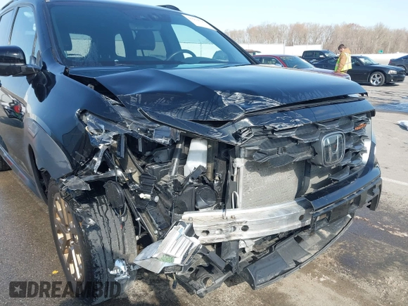 2022 Honda Passport TrailSport z VIN 5FNYF8H63NB015562, wystawiony jako IAAI lot #41914797 z przebiegiem 58 084 mil mil oraz . Historia ofert i sprzedaży dostępna na DreamBid. Obrazek 6.