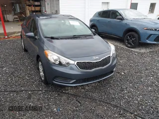 2016 Kia Forte LX with VIN KNAFK4A69G5560835, listed as a IAAI auction lot 42003212 with 100,873 mi miles. Bid and sale history available at carsss.com. Image 1.