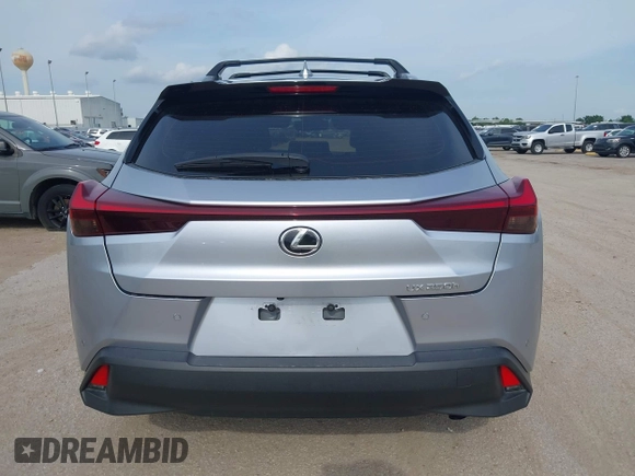 2023 Lexus UX 250h Premium z VIN JTHP6JBH5P2145912, wystawiony jako IAAI lot #42401353 z przebiegiem 14 252 mil mil oraz . Historia ofert i sprzedaży dostępna na DreamBid. Obrazek 16.