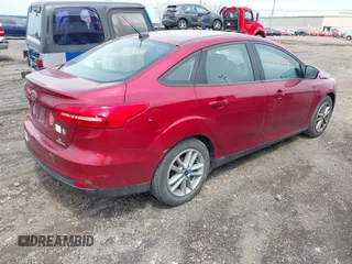 2015 Ford Focus SE with VIN 1FADP3F21FL296327, listed as a IAAI auction lot 42171777 with 122,135 mi miles and . Bid and sale history available at DreamBid. Image 4.