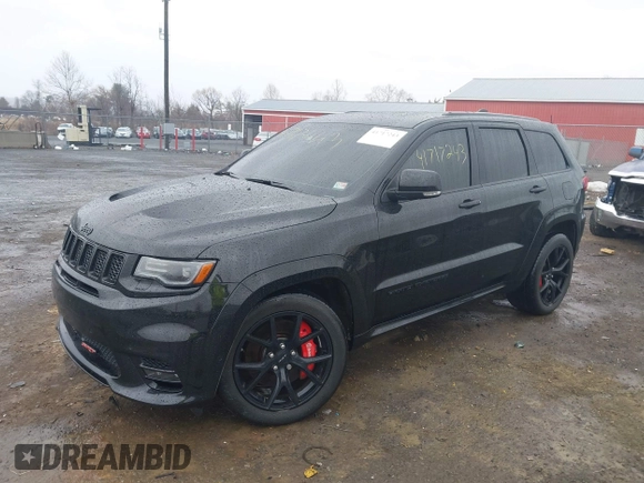 2018 Jeep Grand Cherokee SRT z VIN 1C4RJFDJ2JC391503, wystawiony jako IAAI lot #41717243 z przebiegiem 78 157 mil mil oraz . Historia ofert i sprzedaży dostępna na DreamBid. Obrazek 17.