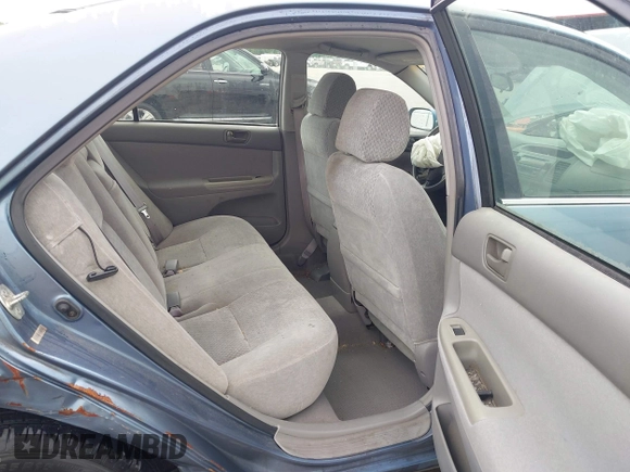 2002 Toyota Camry LE z VIN 4T1BE32KX2U617732, wystawiony jako IAAI lot #42208913 z przebiegiem Nie podano mil oraz . Historia ofert i sprzedaży dostępna na DreamBid. Obrazek 8.