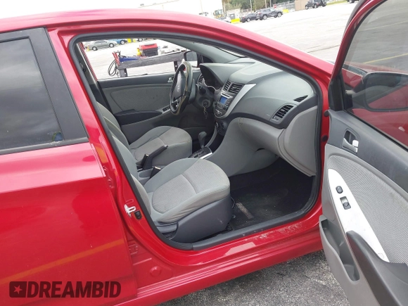 2013 Hyundai Accent GS z VIN KMHCT5AE2DU123126, wystawiony jako IAAI lot #40902043 z przebiegiem 97 822 mil mil oraz . Historia ofert i sprzedaży dostępna na DreamBid. Obrazek 5.