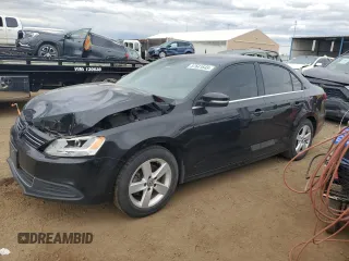 2014 Volkswagen Jetta TDI w/Premium with VIN 3VW3L7AJ9EM438697, listed as a Copart auction lot 57641645 with 191,231 mi miles and Salvage title. Bid and sale history available at DreamBid. Image 1.