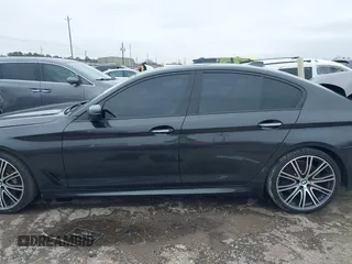 2017 BMW 5 Series 540i with VIN WBAJE5C37HG914013, listed as a IAAI auction lot 41619362 with 64,005 mi miles and . Bid and sale history available at DreamBid. Image 14.