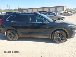 2023 Honda CR-V Sport Touring with VIN 2HKRS6H97PH804042, listed as a IAAI auction lot 42041207 with 19,152 mi miles and . Bid and sale history available at DreamBid. Image 13.