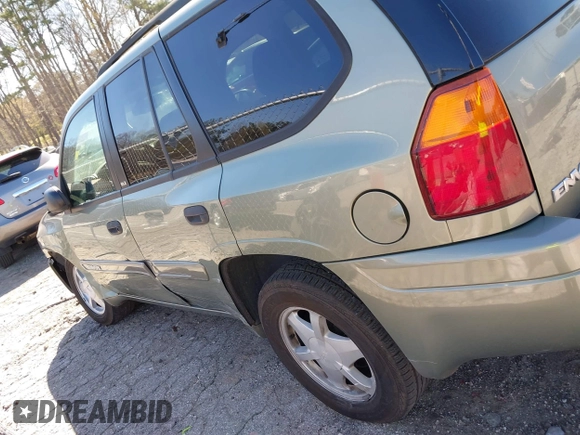 2003 GMC Envoy SLT with VIN 1GKDS13S432373988, listed as a IAAI auction lot 41840744 with 221,306 mi miles. Bid and sale history available at carsss.com. Image 14.