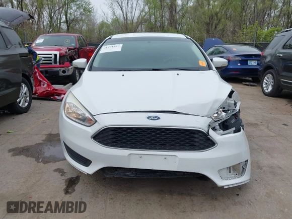 2016 Ford Focus SE with VIN 1FADP3F2XGL324613, listed as a IAAI auction lot 41971597 with 126,738 mi miles. Bid and sale history available at carsss.com. Image 12.