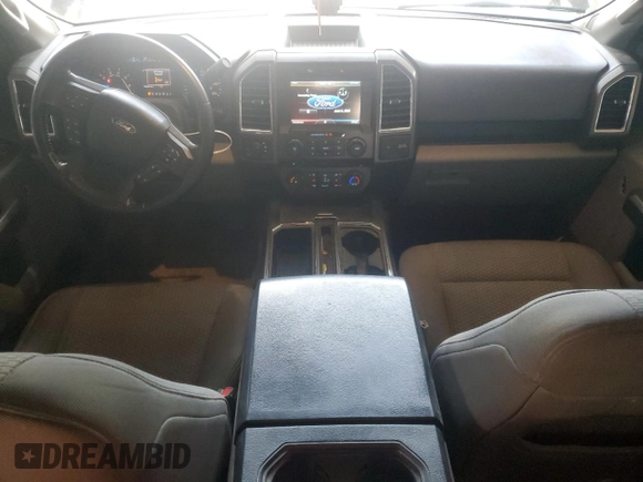2015 Ford F-150 XLT with VIN 1FTEW1EF0FFA69722, listed as a Copart auction lot 59671695 with 189,690 mi miles and Salvage title. Bid and sale history available at DreamBid. Image 8.